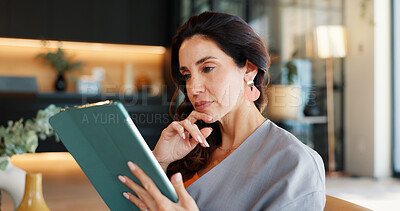 Buy stock photo Home, thinking and woman in lounge, tablet and serious face with problem solving, rent and network. Mature person, apartment and technology with research for real estate, mortgage and connection