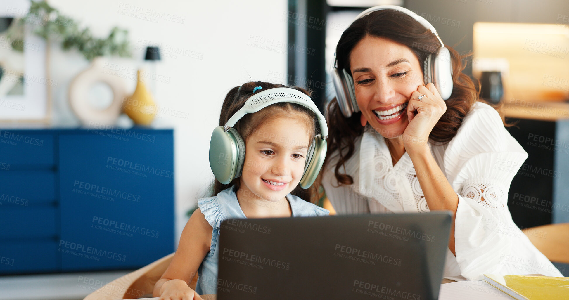 Buy stock photo Headphones, laptop and mom with child for elearning in home for education, development or growth. Happy, helping and mother with girl kid for computer with audio tech for online lesson in house. 