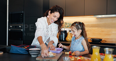Buy stock photo Mom, girl and packing lunch box in kitchen with sandwich, fruit and excited for back to school. Food, mother and daughter with smile for bread, snack and meal for nutrition with care in family house