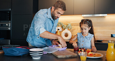 Buy stock photo Dad, girl and packing lunch box in kitchen with sandwich, fruit and ready for back to school. Food, father and daughter with love for bread, snack and meal for nutrition with child in family house