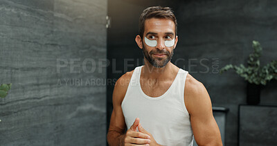 Buy stock photo Beauty, eye mask and facial with man in bathroom of home for antiaging cosmetology or wellness. Cosmetic product, dermatology and treatment application with person in apartment for morning skincare