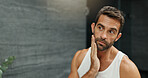 Man, mirror and check hair in bathroom for beard growth, grooming routine and natural texture. Male person, reflection and facial inspection with beauty, maintenance treatment and self care at house