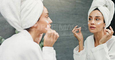 Buy stock photo Skincare, mirror and woman with face cream in bathroom for skin hydration, collagen treatment and morning routine. Beauty, reflection and product application for moisturizer, wellness and anti aging