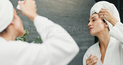 Buy stock photo Skincare, mirror and woman with serum in bathroom for skin hydration, anti aging and morning routine. Beauty, reflection and mature person with oil application for moisturizer and wellness in home