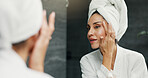 Skincare, reflection and woman in bathroom for natural, moisturizing and morning routine in home. Cosmetic, wellness and female person by mirror for facial dermatology treatment for clean in house.