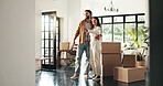 Smile, couple and talk with hug at new house for planning, decor ideas and interior design of lounge. Happy, people and boxes with discussion for real estate, explain layout and apartment renovation