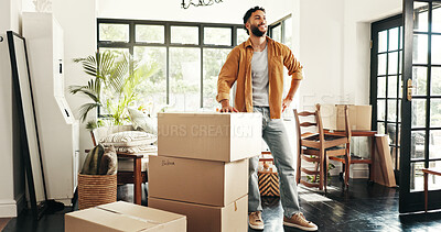 Buy stock photo Moving in, smile and man with boxes, thinking and ownership of property with mortgage or real estate. Relocation, buyer and person with cardboard in living room, investment or purchase with home loan