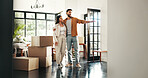 New house, moving and couple with boxes, real estate and ownership of property with mortgage or lounge. Relocation, buyer and people with cardboard in living room, talking and purchase with home loan