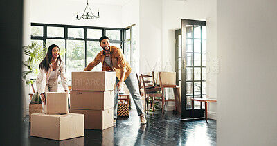 Buy stock photo Buyer, moving and couple with boxes, real estate and ownership of property with mortgage and lounge. Relocation, happy and people with cardboard in living room, investment and purchase with home loan