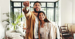 Key, happy and portrait of couple in new home with pride for property investment or real estate. Smile, confident and people from India with ownership for house with goal for buying apartment.
