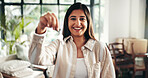 Key, happy and portrait of woman in new home with pride for property investment or real estate. Smile, confident and female person from India with ownership for house with goal for buying apartment.