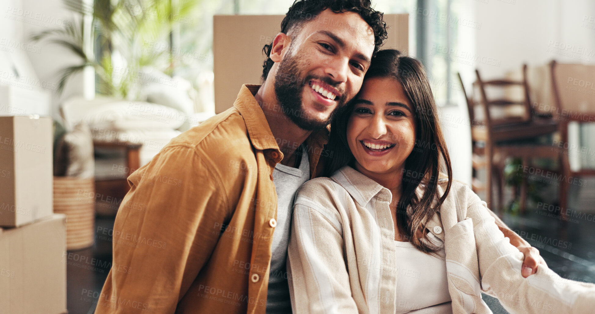 Buy stock photo Hug, mortgage and portrait of couple in living room of new home together for milestone or property investment. Boxes, love or smile with man and woman in apartment for bonding, growth or real estate