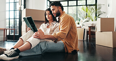 Buy stock photo Tablet, boxes and couple in new home with planning for renovation. development or moving. Cardboard package, real estate and man with woman on digital technology for online order in apartment.