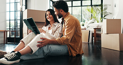 Buy stock photo Tablet, boxes and people in new home with planning for renovation. development or moving. Cardboard packages, real estate and couple on digital technology for online order with property investment.