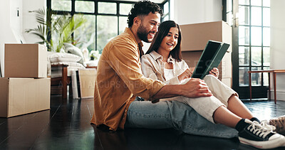 Buy stock photo Tablet, reading and couple in new home with planning for renovation. development or moving. Cardboard packages, real estate and man with woman on digital technology for online order in apartment.