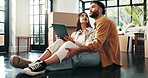 Tablet, renovation and couple in new home with planning for maintenance, development or moving. Cardboard package, real estate and man with woman on digital technology for online order in apartment.
