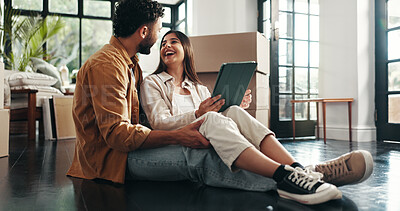 Buy stock photo Tablet, laughing and couple in new home with planning for renovation. development or moving. Cardboard boxes, real estate and man with woman on digital technology for online order in apartment.