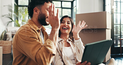 Buy stock photo Smile, couple and high five on tablet in new home for mortgage investment, renovation support and decision. People, real estate and celebration with boxes, property success and relocation achievement
