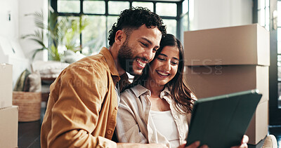 Buy stock photo Boxes, smile and tablet with couple in living room of new home together for property investment. Loan, milestone or mortgage with happy man and woman in apartment for growth, planning or real estate