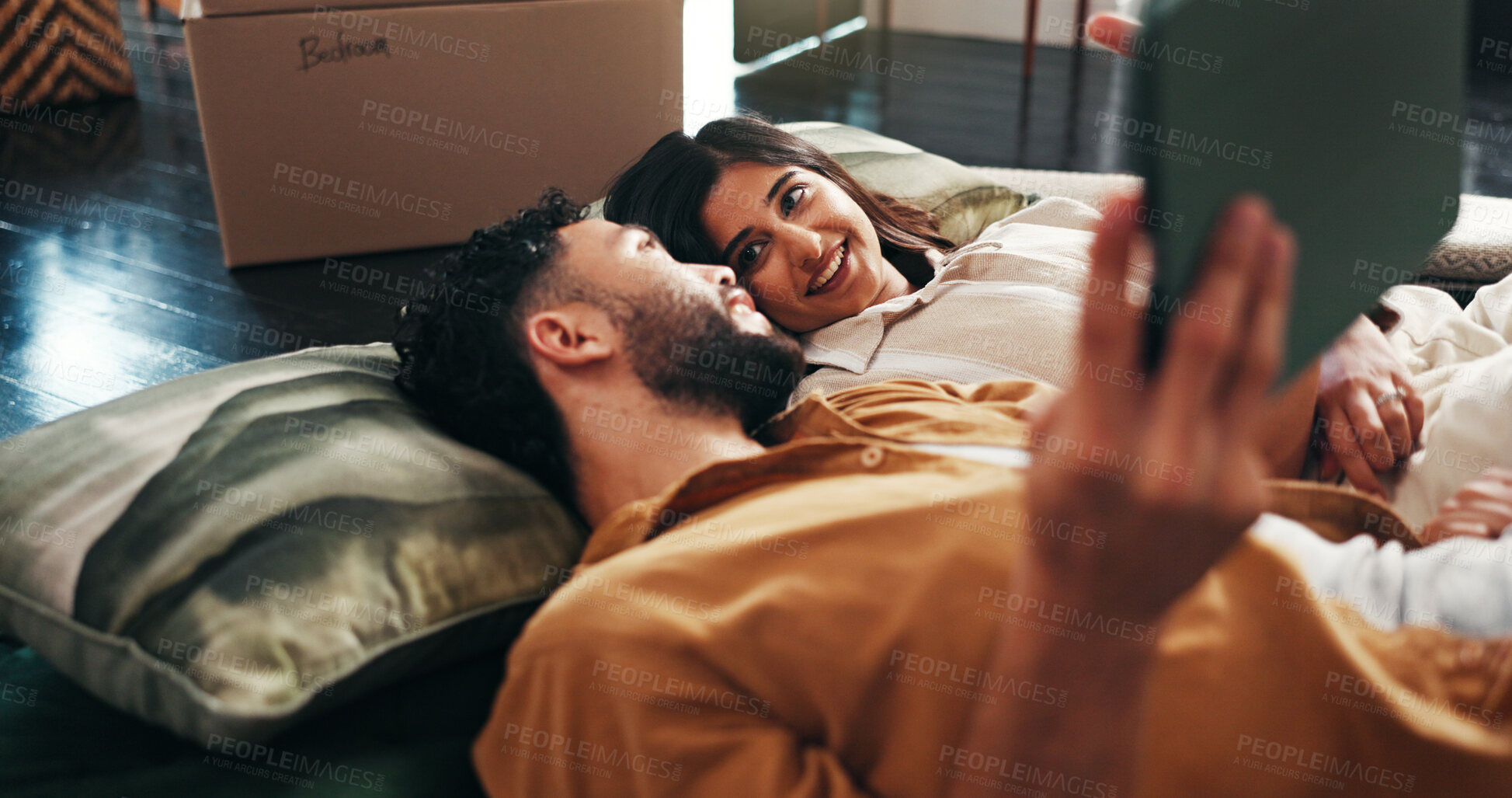 Buy stock photo Smile, couple and relax with tablet in new home for discussion, interior design and online shopping. People, talk and digital with planning, furniture search and boxes for start of renovation process