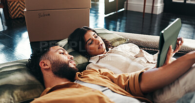 Buy stock photo Couple, talk and floor on tablet in new home for relocation, interior design and online shopping. People, planning and discussion for digital app, furniture search and decision for renovation process