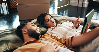 Buy stock photo Couple, talk and ideas on tablet in new home for relocation, interior design and online shopping. People, planning and discussion for digital app, furniture search and decision for renovation process