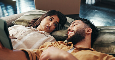 Buy stock photo Couple, relax and ideas on tablet in new home for relocation, interior design and online shopping. Above, people and discussion for digital app, furniture search and decision for renovation planning