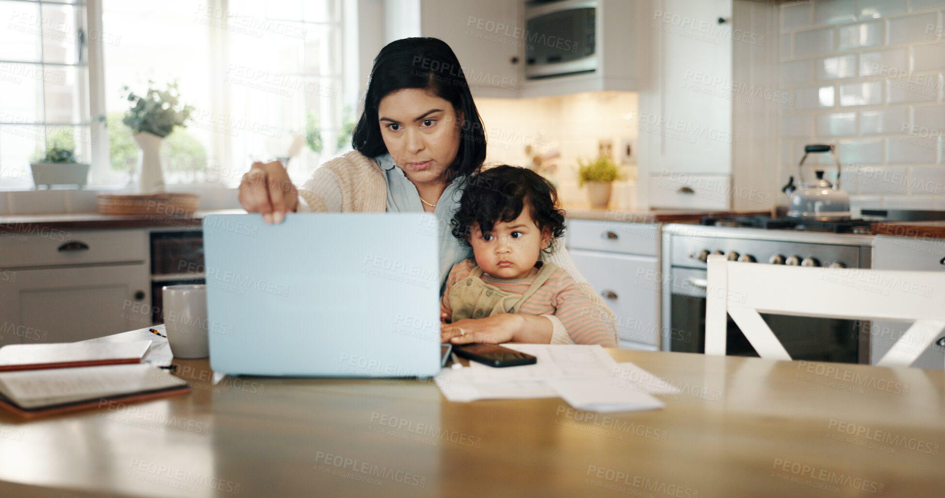 Buy stock photo Kitchen, child and mom with laptop, remote work and bookkeeper with paperwork in home, family and online. Multitasking, mother and care for baby in house, accountant and person with tech for project