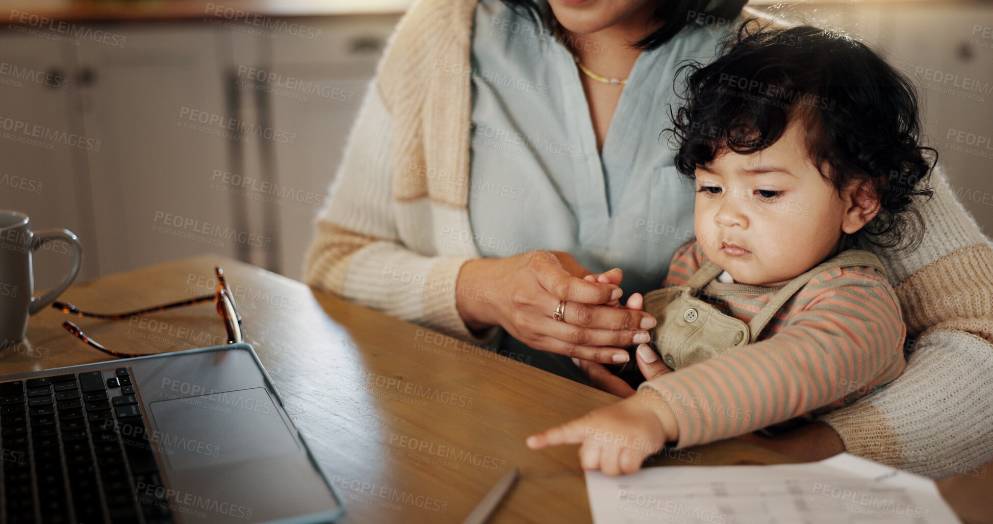Buy stock photo Home, child and mom with laptop, remote work and bookkeeper with paperwork in kitchen, family and online. Multitasking, mother and care for baby in house, accountant and person with tech for project