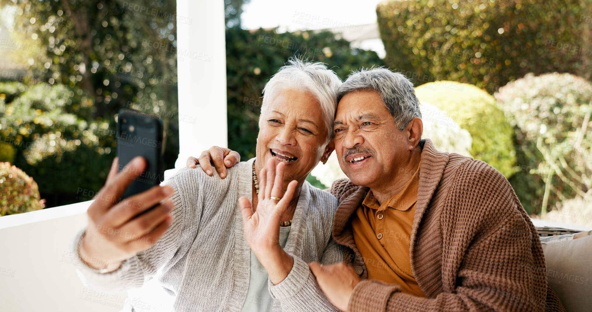 Buy stock photo Wave, video call and phone with old couple in home for communication, social media and post. Happiness, retirement and contact with senior man and woman in backyard for online and connection