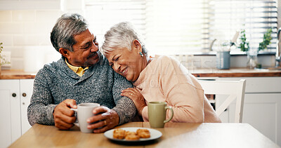 Buy stock photo Hug, laughing and senior couple with coffee, kitchen and bonding with beverage in home or elderly people. Happy, old man and mature woman with tea in house, comfortable and funny joke in morning