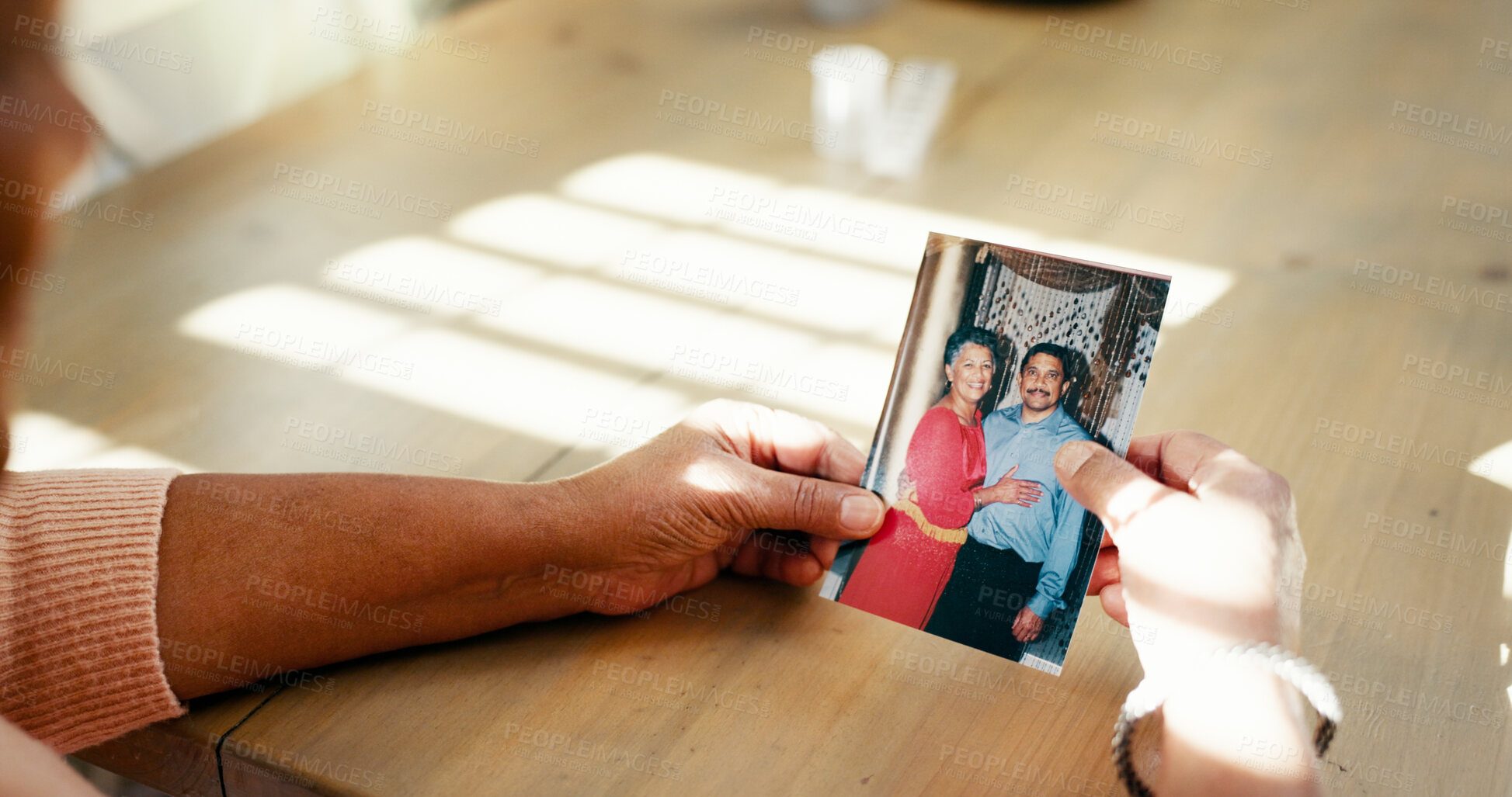 Buy stock photo Hands, senior woman and picture at house for mourning loss, memory past and reminder of broken heart. Elderly person, grief and old image with loneliness, remember partner and nostalgia of retirement