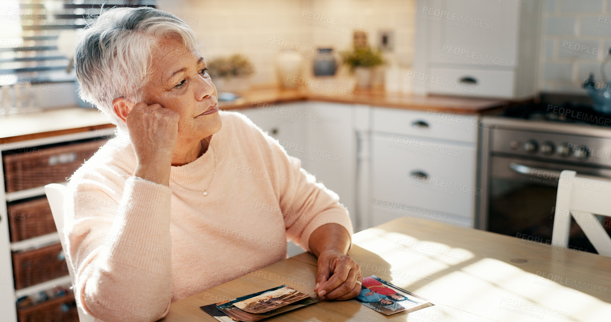 Buy stock photo Thinking, senior woman and picture at house for mourning loss, memory past and reminder for history. Elderly person, grief and old image with loneliness, remember partner and nostalgia for retirement