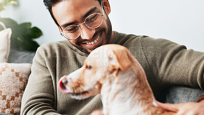 Buy stock photo Smile, man and play with pet dog in home for love, care and bonding together as friends or companion with loyalty. Animal, stroke and person in living room on sofa for support, connection and relax