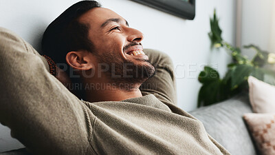 Buy stock photo Calm, stretching and smile with man on sofa for peace, comfortable and resting. Happiness, cozy and satisfied with male person in living room of home for weekend break, wellness and wellbeing