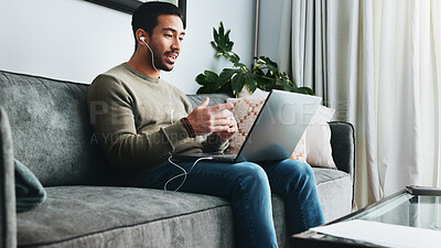 Buy stock photo Laptop, remote work and man on video call with earphones for online conference and meeting in home. Computer, living room and freelancer in virtual chat, webinar and conversation for business advice
