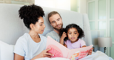 Buy stock photo Parents, girl and story book in bed for reading, happy and learning with care, guide or language in home. Father, mother and daughter with relax, love or smile for bonding at interracial family house