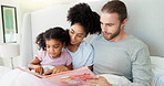 Dad, mom and girl with story book in bed for reading, happy and learning with care, guide and language in home. Father, mother and daughter with relax, love and smile at interracial family house