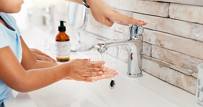 Buy stock photo Washing hands, child and parent with faucet, water and helping with hygiene, soap and bacteria in home. People, kid and cleaning with liquid, care and routine for wellness in morning at family house