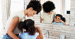 Girl, mom and child brushing teeth for hygiene, morning routine or teaching healthy oral habits in home. Happy parent, kid and learning dental cleaning in bathroom with toothbrush, mother or care
