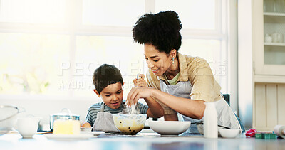 Buy stock photo Happy, mom and son in kitchen, baking and teaching child with ingredients, dessert and conversation. Bonding, kid and woman with recipe for cake, talking and preparation for snack in morning or house