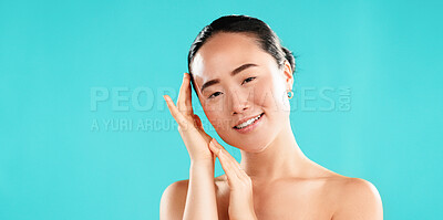 Buy stock photo Beauty, skincare and portrait of Asian woman on blue background for wellness, cosmetics and facial treatment. Dermatology, mockup space and person for healthy skin, salon and spa benefits in studio