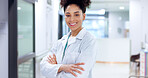 Arms crossed, doctor and portrait of woman in hospital for healthcare or medical appointment. Checkup, smile and trust with happy medicine professional in clinic for consulting, diagnosis or medicare