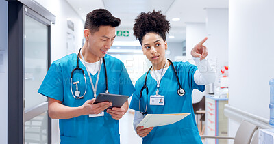 Buy stock photo Teamwork, people and surgeon on tablet for planning medical test, talking and appointment booking. Walking, research or doctors with touchscreen for online report, schedule or health app at hospital