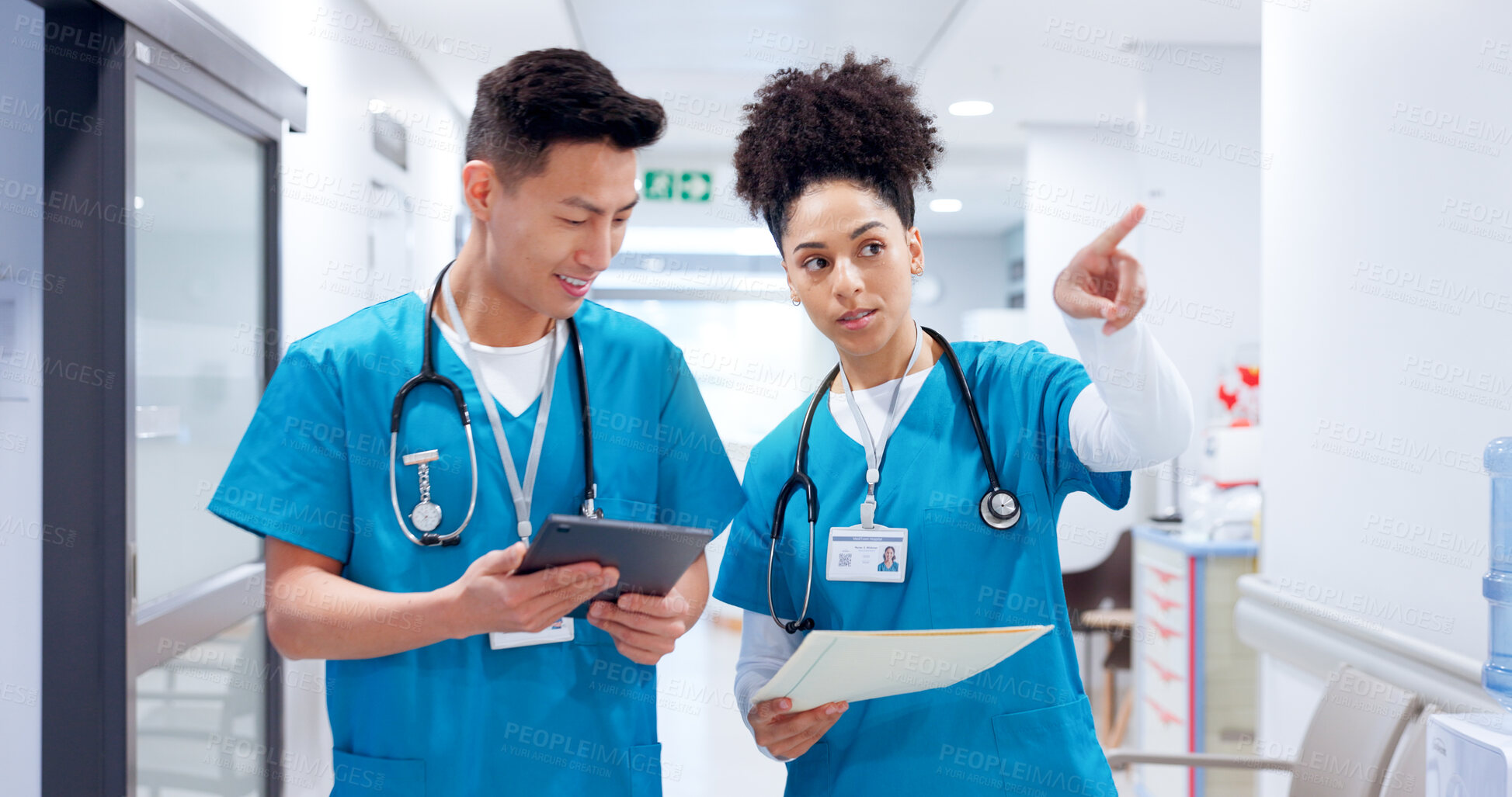 Buy stock photo Teamwork, people and surgeon on tablet for planning medical test, talking and appointment booking. Walking, research or doctors with touchscreen for online report, schedule or health app at hospital