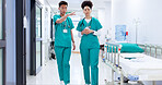 Hospital, discussion and nurses in hallway talking for consulting, patient results and planning. Healthcare, collaboration and man and woman with for medical service, diagnosis and help in clinic