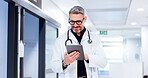 Mature, man and doctor on tablet in hospital for test results, medical update or appointment booking. Lobby, research or surgeon with touchscreen for online report, schedule or health app at clinic