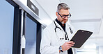 Research, man and doctor on tablet in lobby for test results, medical update or appointment booking. Hospital, mature or surgeon with touchscreen for online report, schedule or health app at clinic