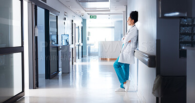 Buy stock photo Doctor, woman and stress in hospital corridor for healthcare fail, medical challenge and bad news. Health professional, arms crossed and thinking of clinic loss, overworked or overwhelmed in hallway