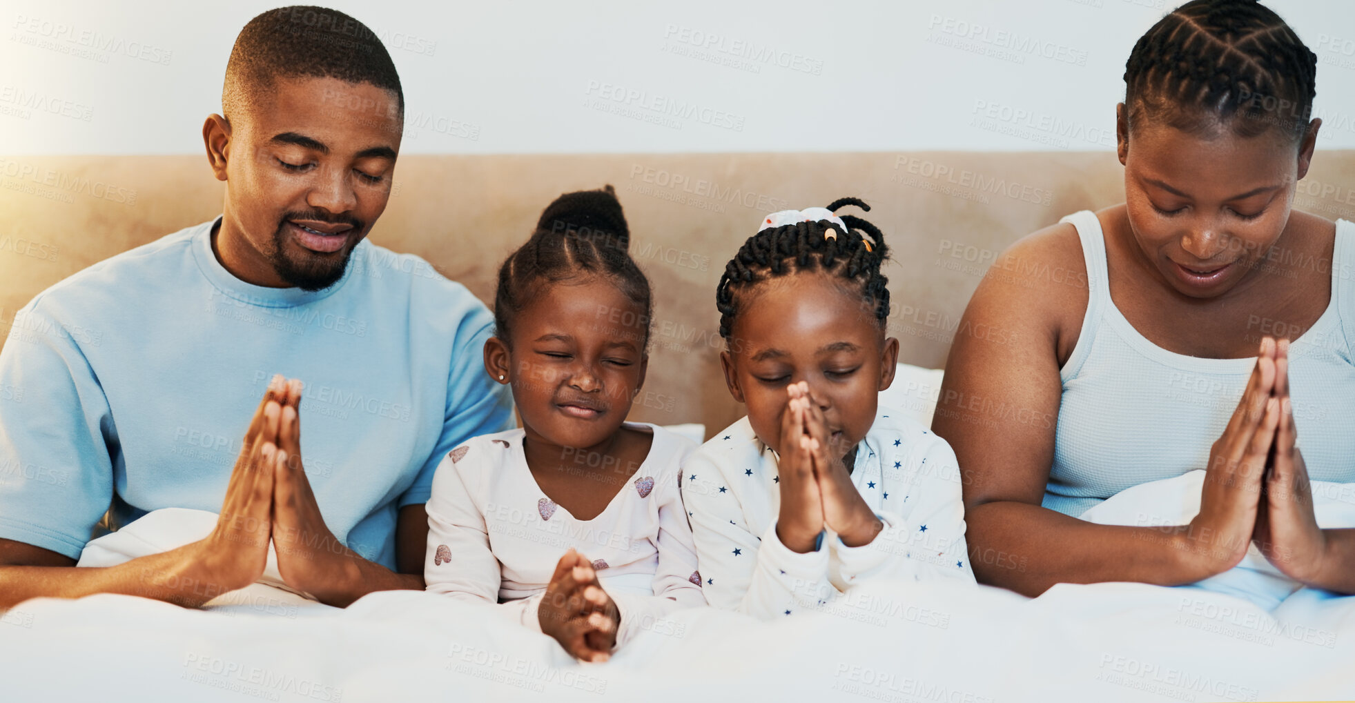 Buy stock photo Worship, support and prayer with black family in bed for trust, spiritual and morning bonding. Love, God and christian faith with parents and children at home for religion, gratitude and catholic